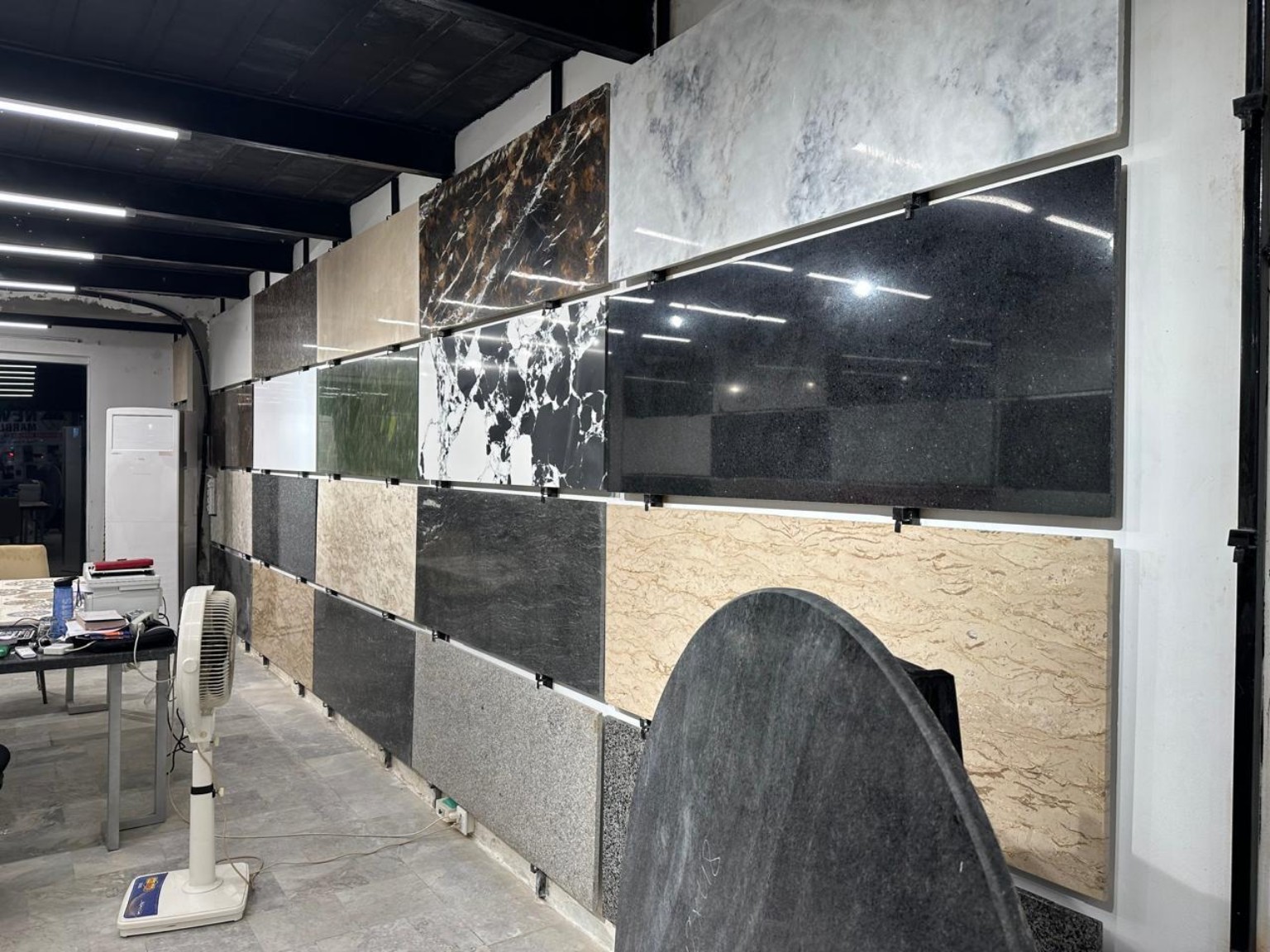 Natural stone panels displayed across the New Eman showroom