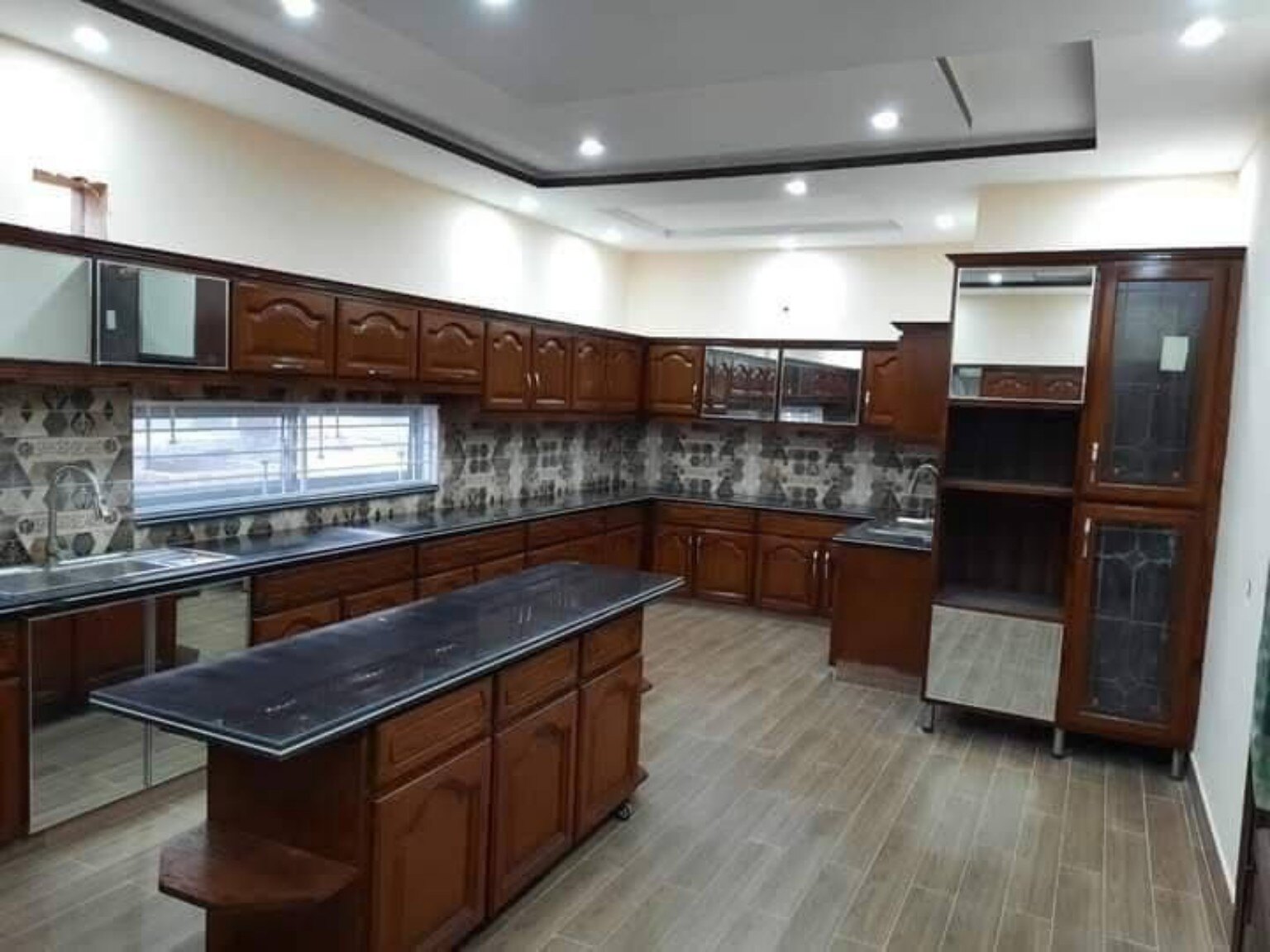 Classic stone kitchen completed by New Eman